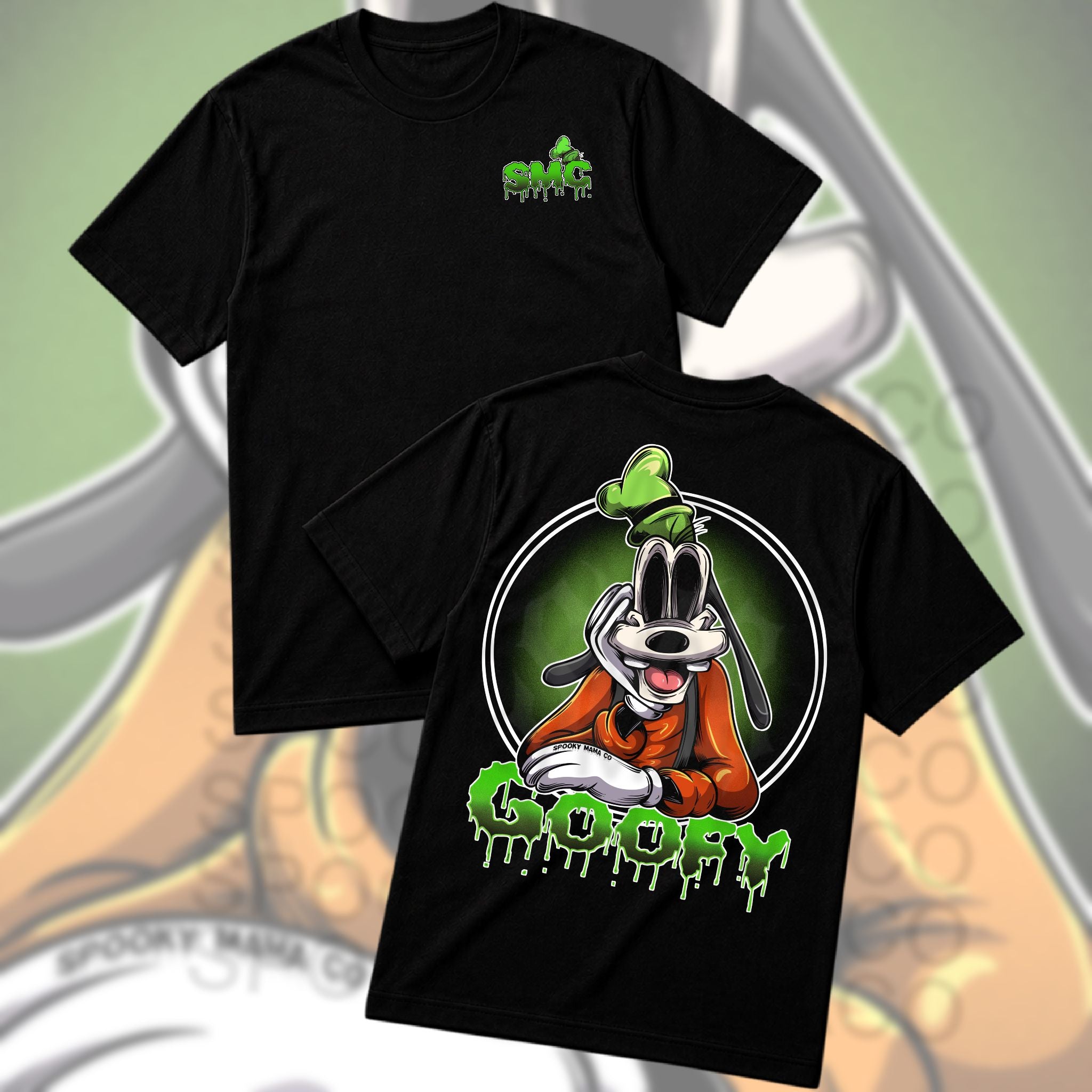 Two black short-sleeve graphic T-shirts shown on a stylized illustrated background. The front shirt has a small green 'Spooky Mama Goofy' logo on the left chest, and the back shirt features a large cartoon Goofy graphic in an orange suit with green 'GOOFY' text below.